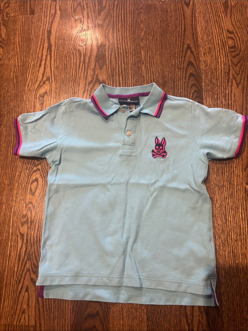 Psycho Bunny Light Blue Polo with Pink Trim